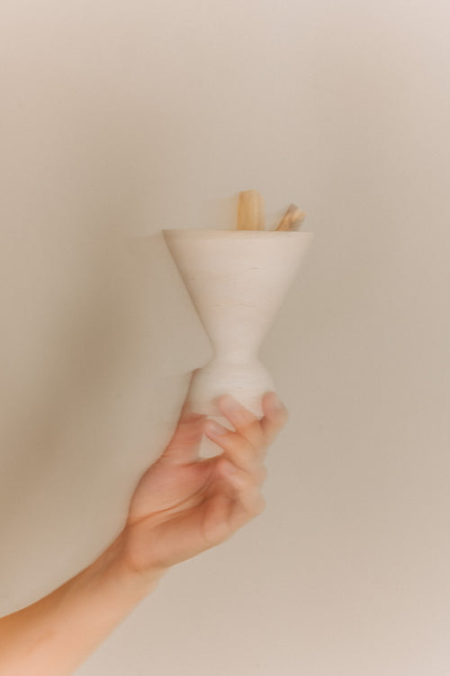 Cone incense holder in solid travertine stone, PACU STUDIOS
