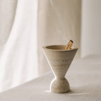 Cone incense holder in solid travertine stone, PACU STUDIOS
