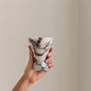 Cone incense holder in Calacatta Viola marble, PACU STUDIOS

