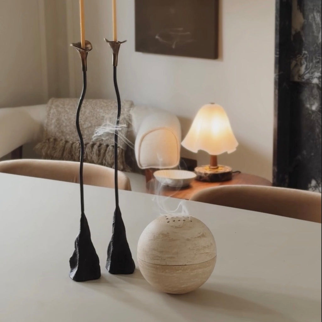 Globe incense sphere in beige travertine stone, PACU STUDIOS

