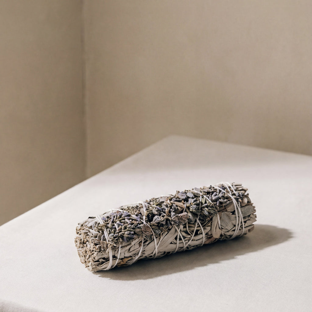 White sage and lavender smudge stick for incense ritual
