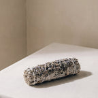 White sage and lavender smudge stick for incense ritual
