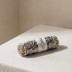 White sage and lavender smudge stick for incense ritual
