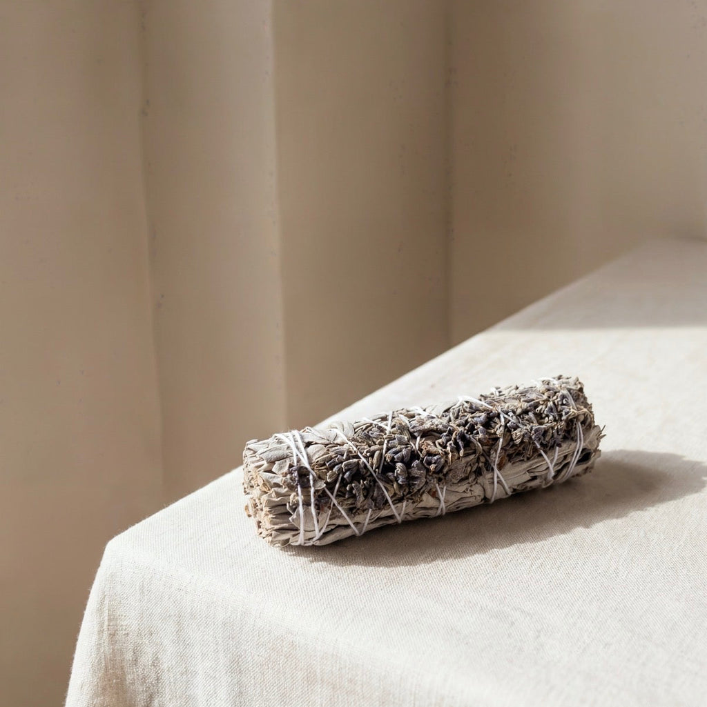 White sage and lavender smudge stick for incense ritual
