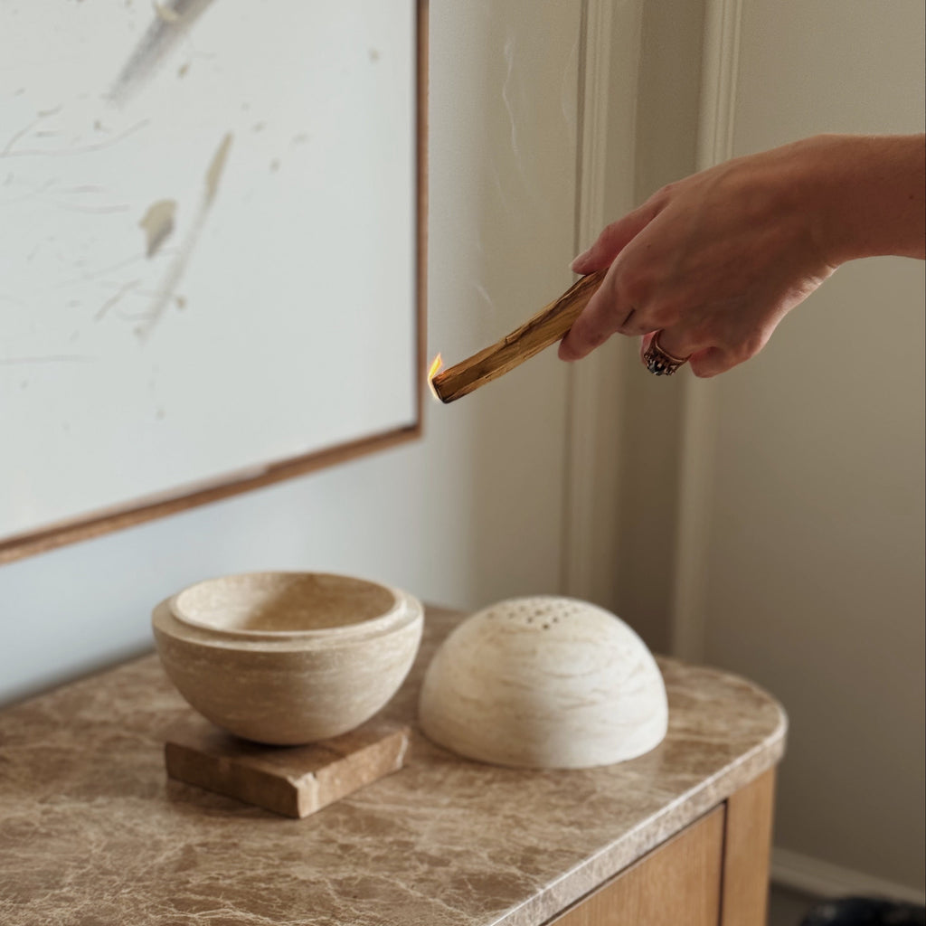 Globe incense holder in beige travertine stone, PACU STUDIOS
