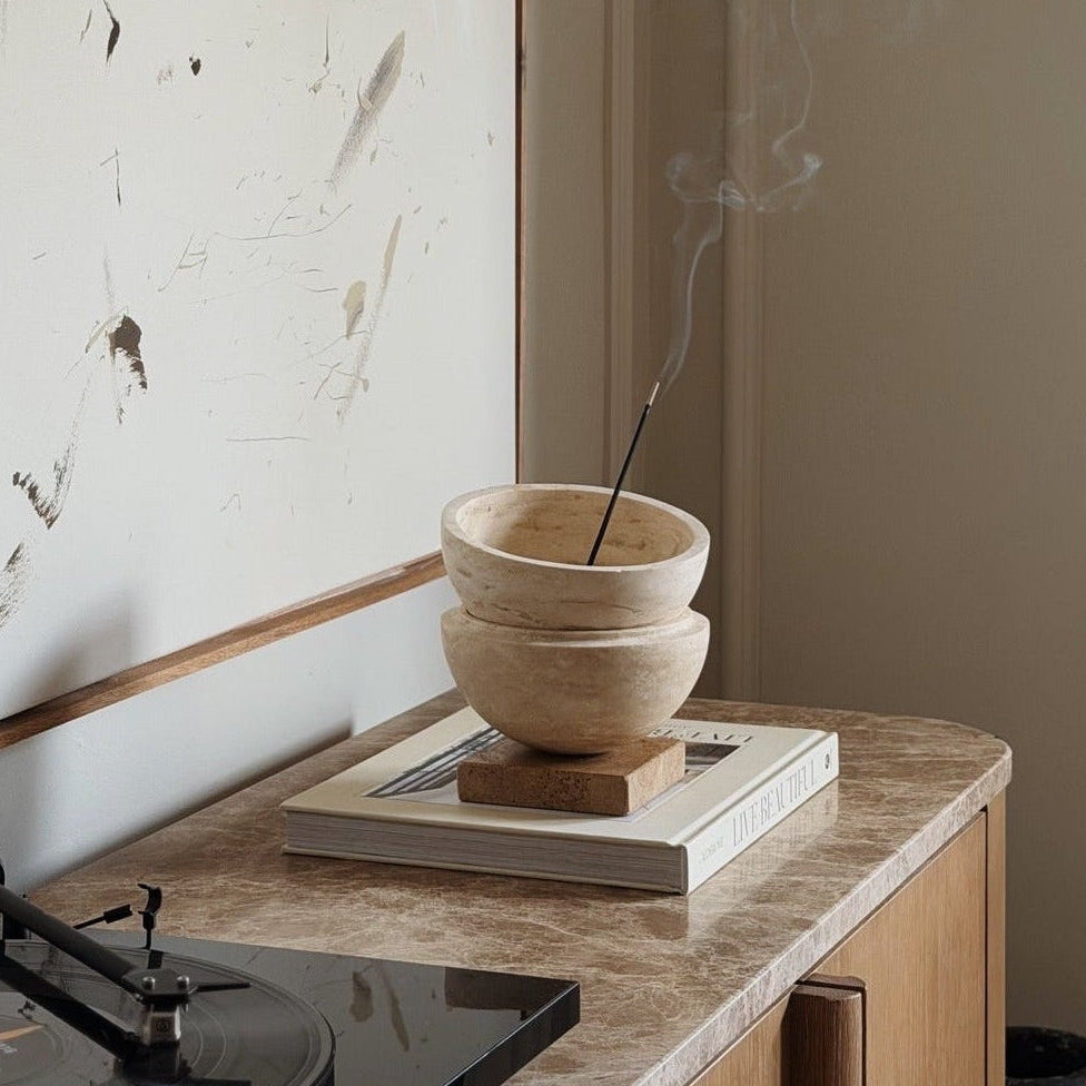 Globe incense holder in beige travertine stone, PACU STUDIOS
