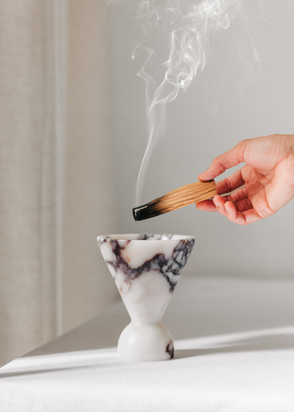 Cone incense holder in Calacatta Viola marble, PACU STUDIOS

